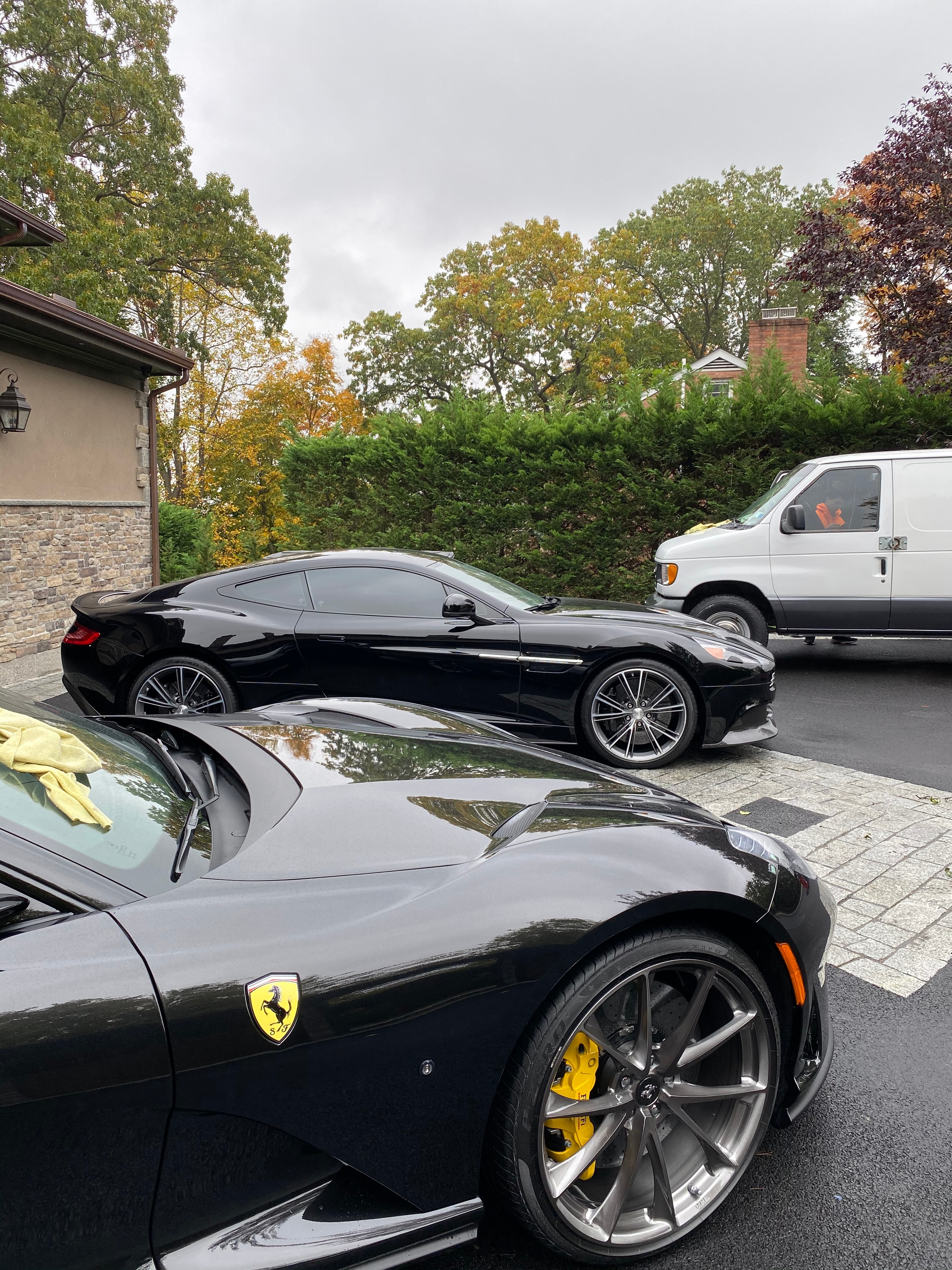 Ferrari and luxury vehicles freshly detailed outdoors